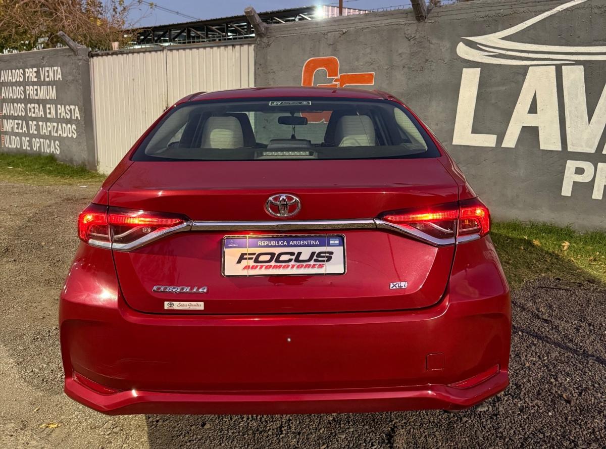 Foto de TOYOTA COROLLA XLI 2020, color rojo, en San Juan