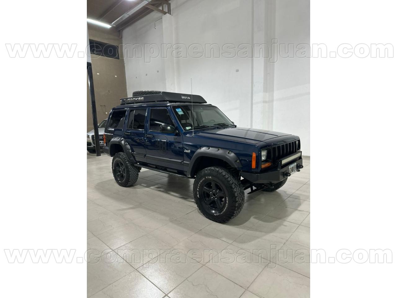 Foto de CHRYSLER / DODGE JEEP CHEROKEE xj equipada 2000, color azul, en San Juan