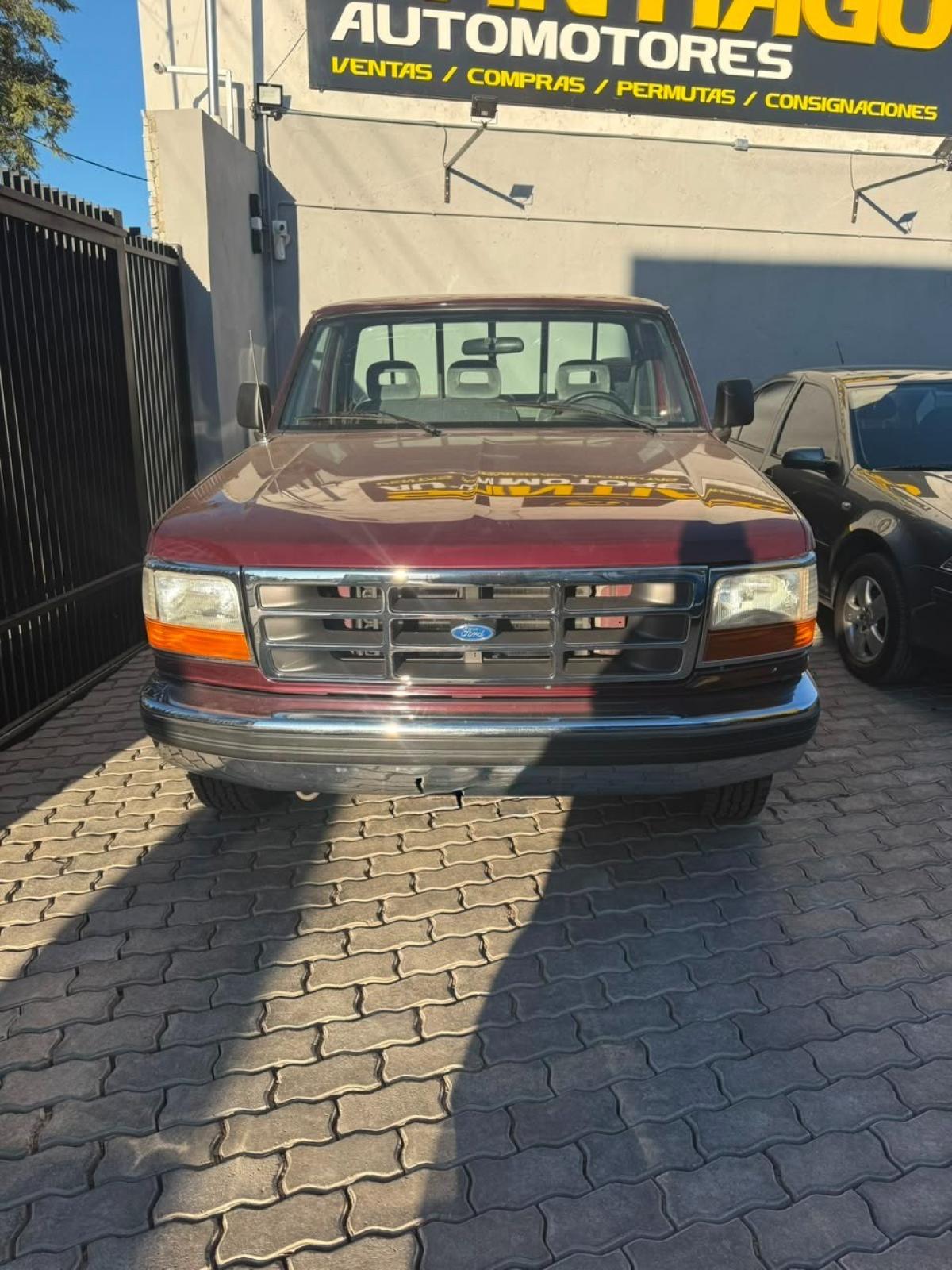 Foto de FORD F-100 HSD XLT 1996, color rojo, en San Juan