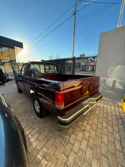 Foto de FORD F-100 HSD XLT 1996, color rojo, en San Juan