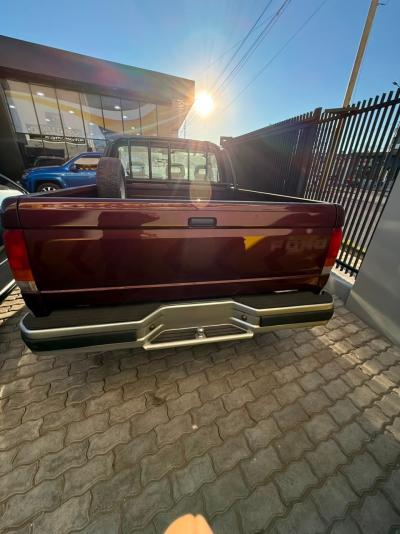 Foto de FORD F-100 HSD XLT 1996, color rojo, en San Juan