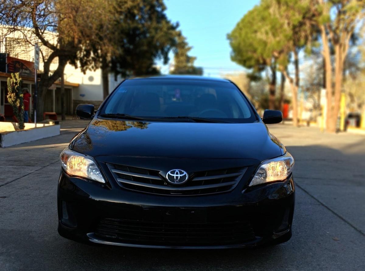 Foto de TOYOTA COROLLA xli 2012, color negro, en San Juan