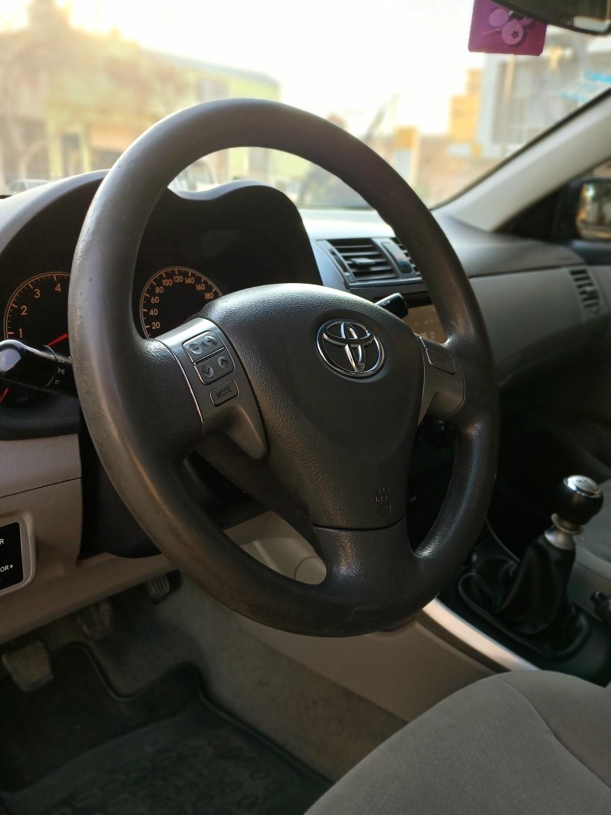Foto de TOYOTA COROLLA xli 2012, color negro, en San Juan