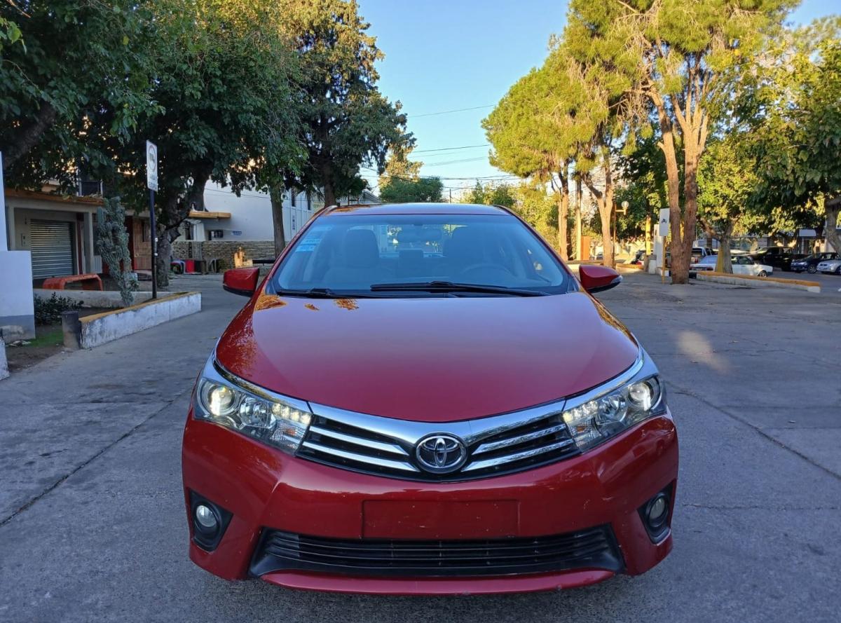 Foto de TOYOTA COROLLA xei 2015, color rojo, en San Juan