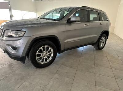 Foto de CHRYSLER / DODGE JEEP GRAND CHEROKEE LIMITED 2013, color plata, en San Juan