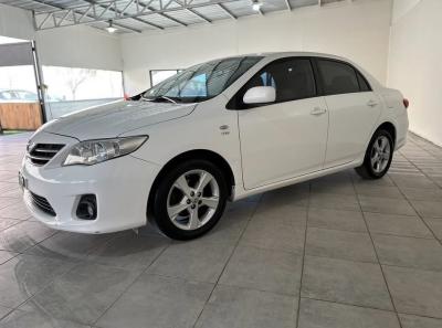 Foto de TOYOTA COROLLA XEI AT 1.8 2014, color blanco, en San Juan