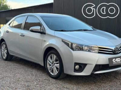 Foto de TOYOTA COROLLA XEI AUT 1.8 2015, color gris, en San Juan