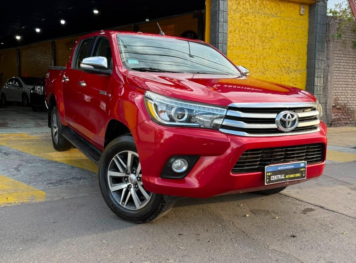 Foto de TOYOTA HILUX SRX AUTOMATICA 2016, color rojo, en San Juan