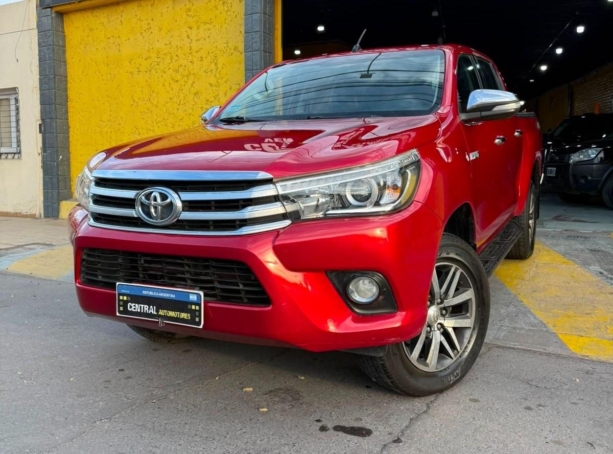 Foto de TOYOTA HILUX SRX AUTOMATICA 2016, color rojo, en San Juan