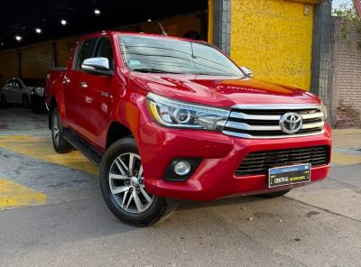 Foto de TOYOTA HILUX SRX AUTOMATICA 2016, color rojo, en San Juan
