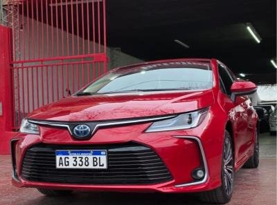 Foto de TOYOTA COROLLA SEG HEV 1.8 2023, color rojo, en San Juan
