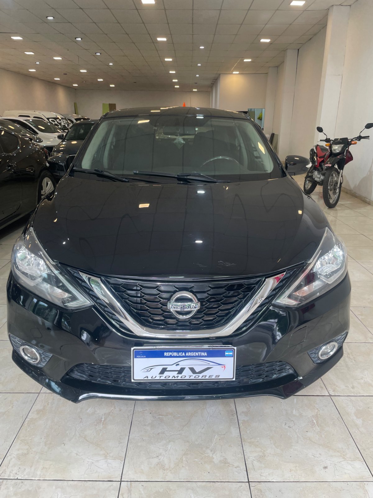 Foto de NISSAN SENTRA EXCLUSIVE 2017, color negro, en San Juan