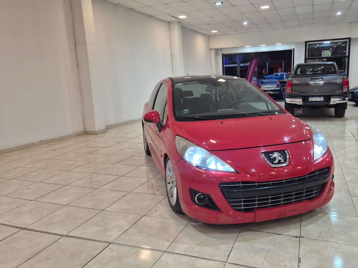 Foto de PEUGEOT 207 GTI 2013, color rojo, en San Juan