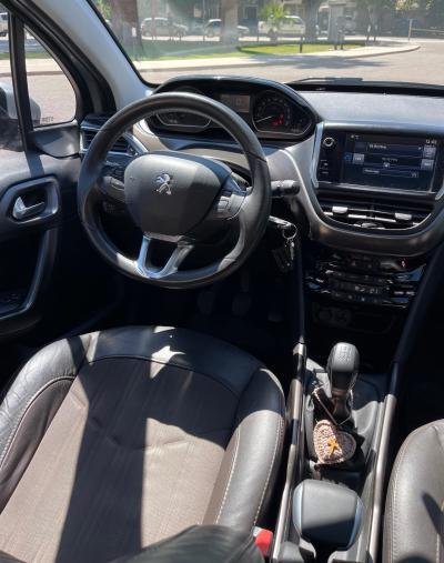 Foto de PEUGEOT 2008 Feline 1.6 2016, color gris, en San Juan