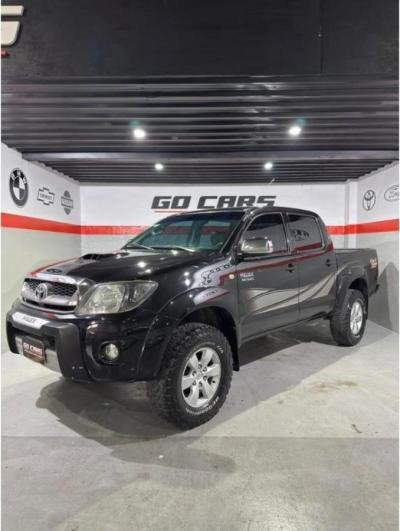 Foto de TOYOTA HILUX SRV 4X4 AT 3.0 2011, color negro, en San Juan
