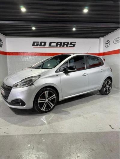 Foto de PEUGEOT 208 1.6 GT 2017, color gris, en San Juan
