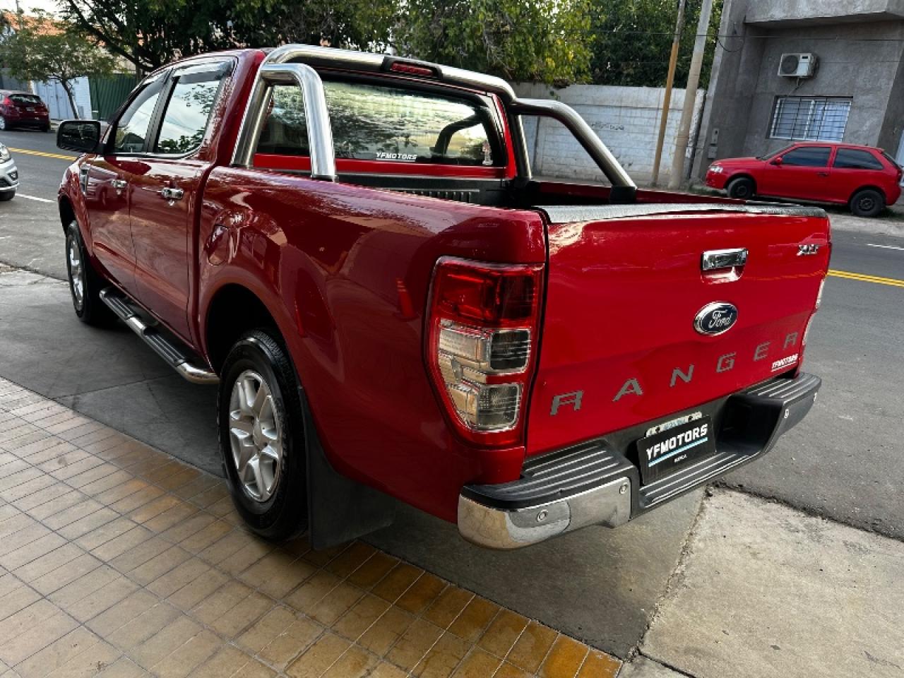 Foto de FORD RANGER XLT 4x2 3.2 2014, color rojo, en San Juan
