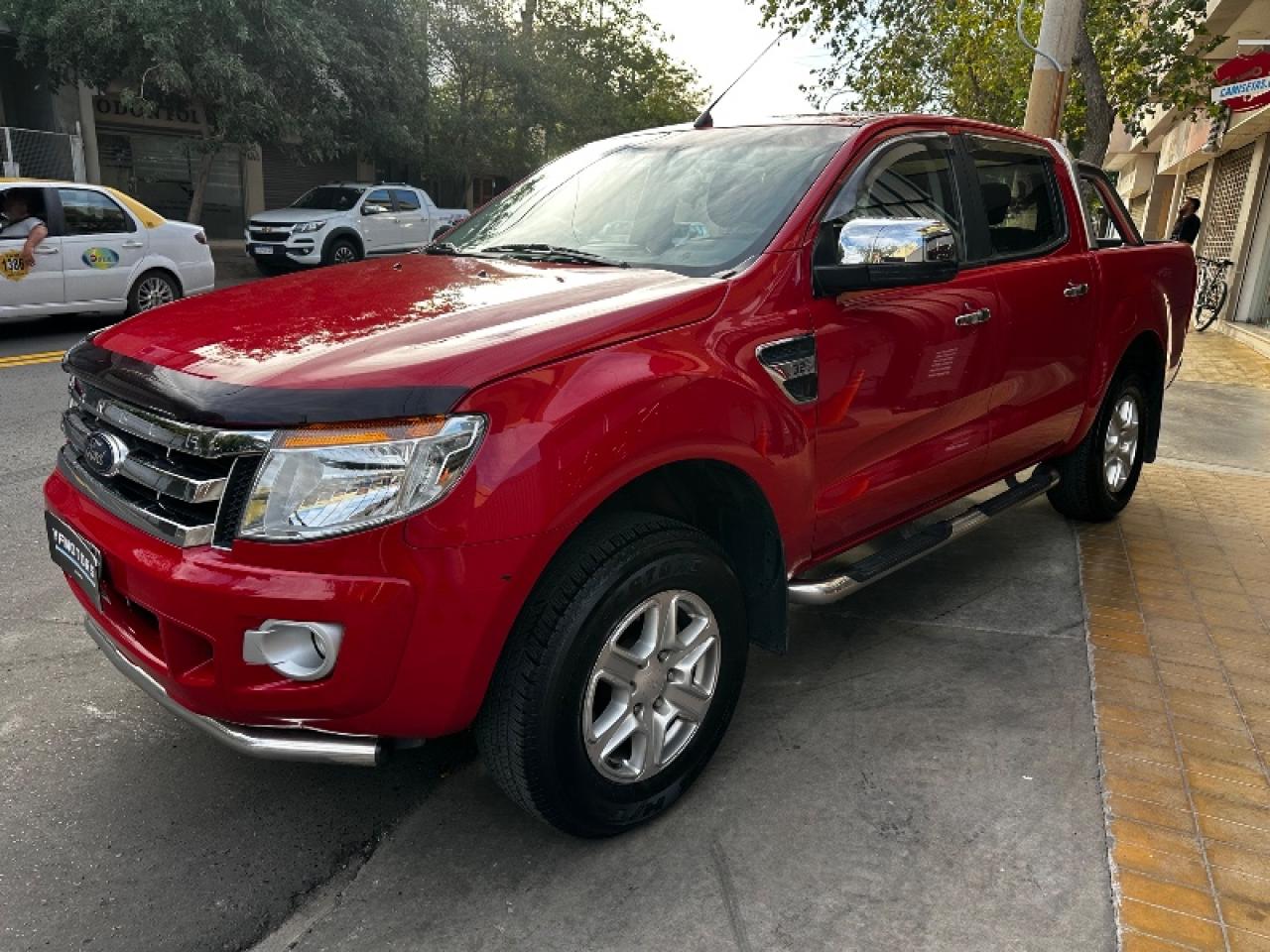 Foto de FORD RANGER XLT 4x2 3.2 2014, color rojo, en San Juan