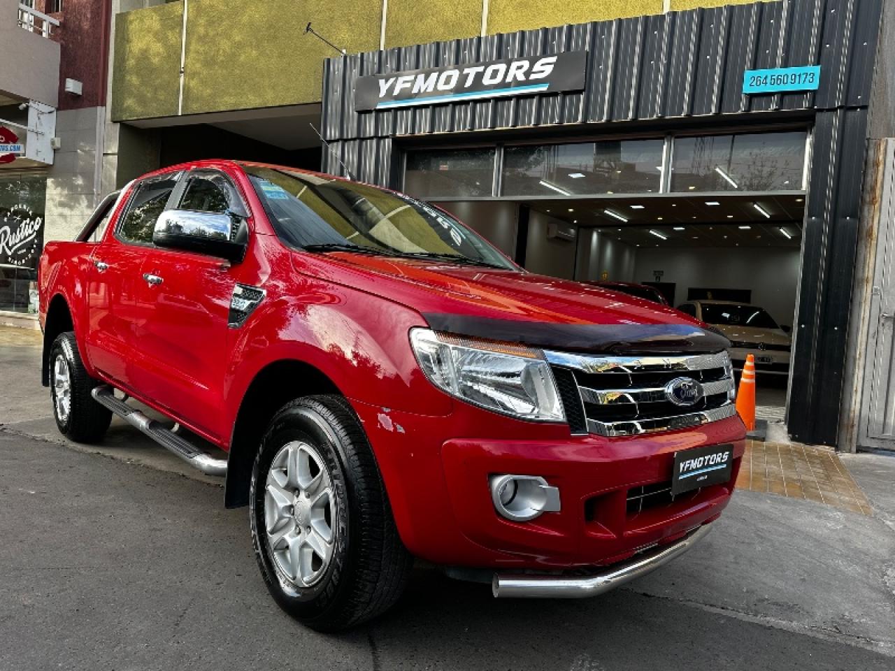 Foto de FORD RANGER XLT 4x2 3.2 2014, color rojo, en San Juan