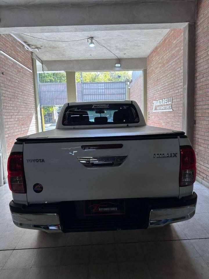 Foto de TOYOTA HILUX Sr 2021, color blanco, en San Juan