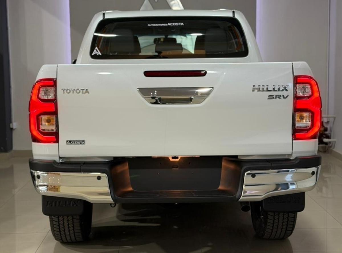 Foto de TOYOTA HILUX SRV+ 4X4 2026, color blanco, en San Juan