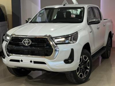 Foto de TOYOTA HILUX SRV+ 4X4 2026, color blanco, en San Juan
