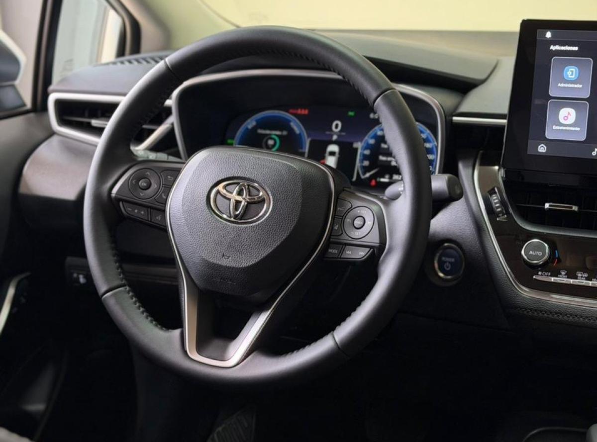 Foto de TOYOTA COROLLA SEG HEV 1.8 2026, color blanco, en San Juan