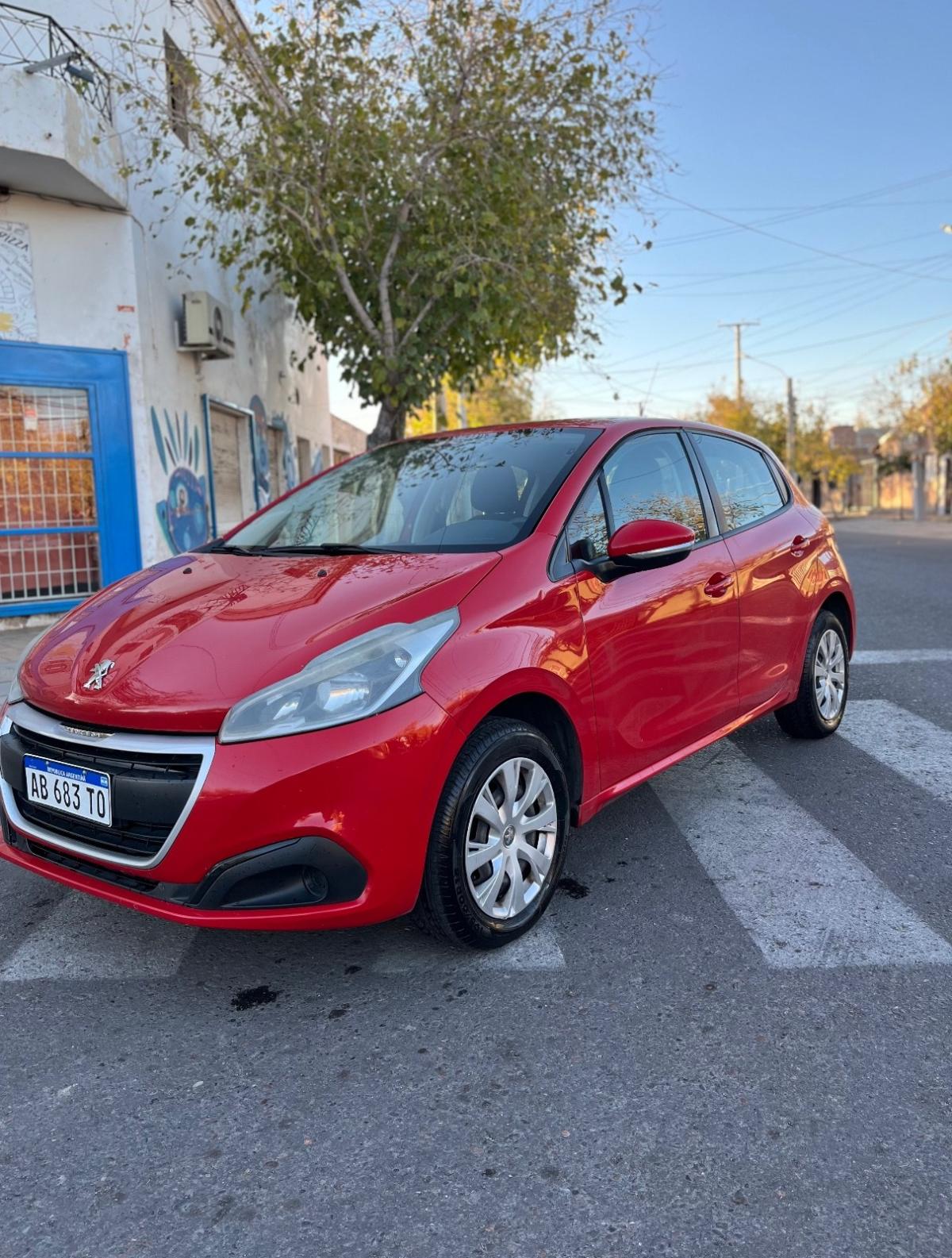 Foto de PEUGEOT 208 1.6 16v Active 2017, color rojo, en San Juan