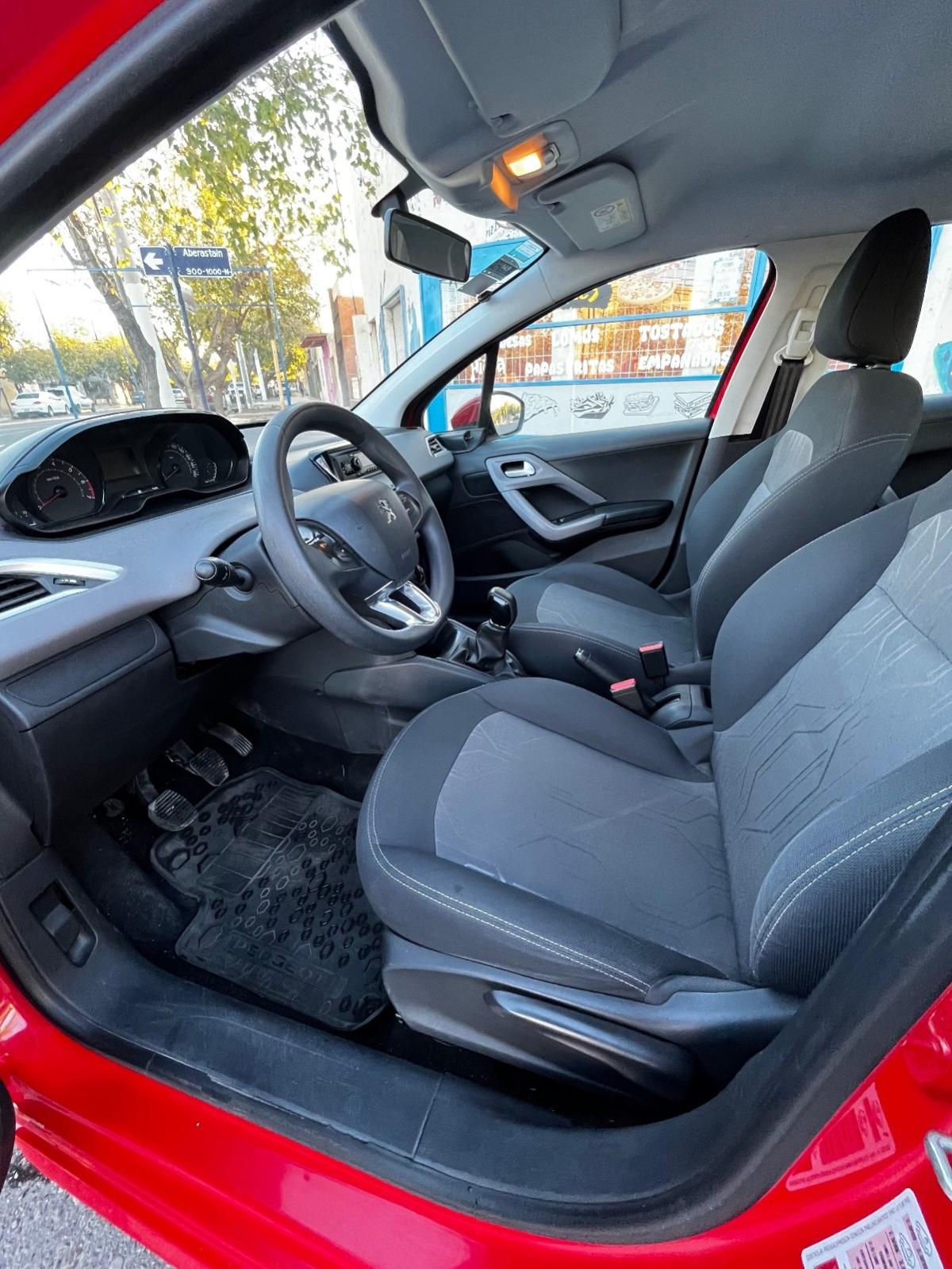 Foto de PEUGEOT 208 1.6 16v Active 2017, color rojo, en San Juan