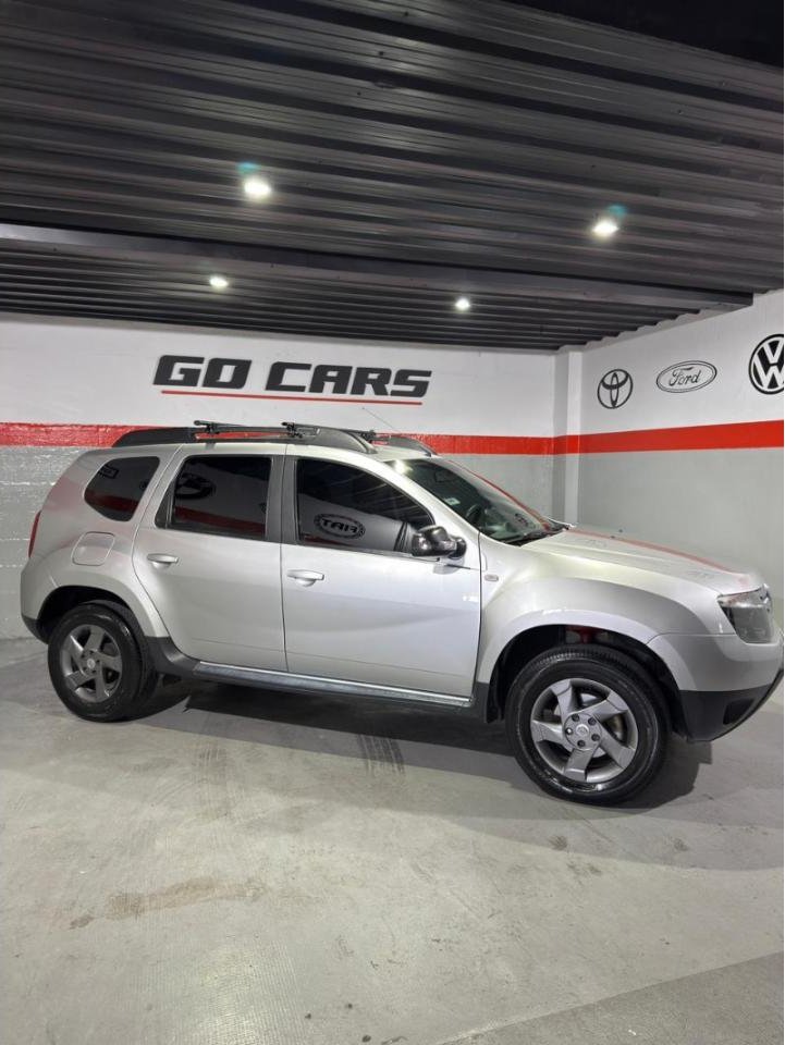 Foto de RENAULT DUSTER 2.0 4X4 luxe nav 2014, color gris, en San Juan