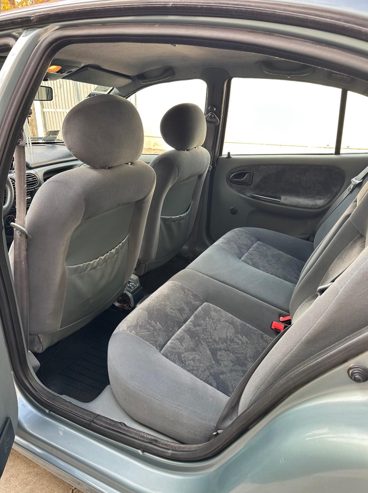 Foto de RENAULT MEGANE RXE TRIC 2.0 1999, color verde, en San Juan