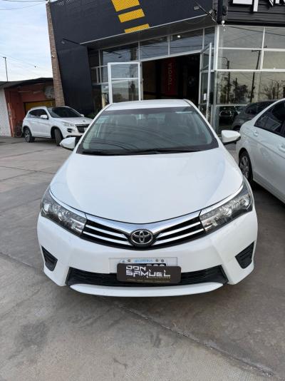 Foto de TOYOTA COROLLA XLI 1,8  CVT 2016, color blanco, en San Juan